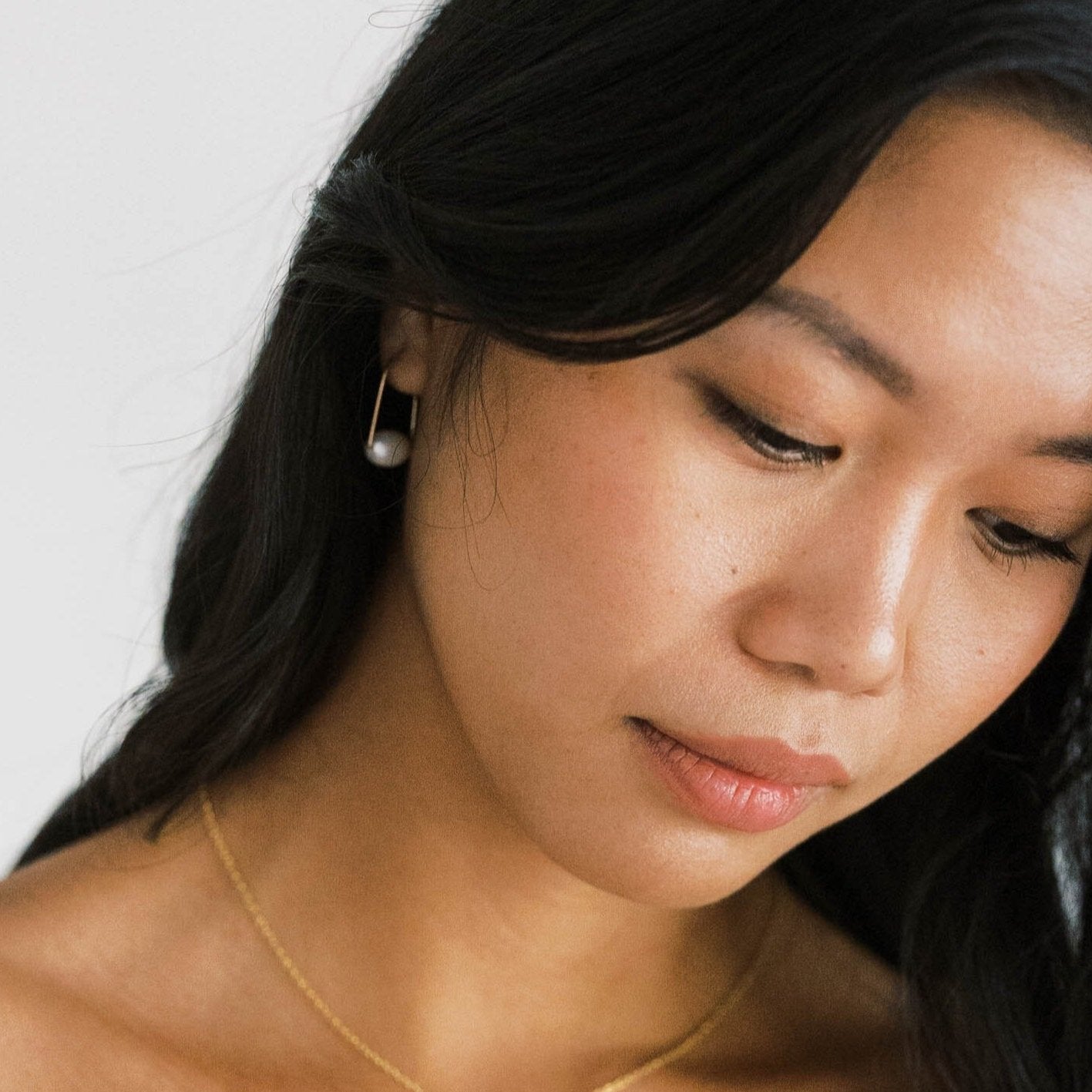 White Pearl modern hoop earrings that are unique. Light and easy to wear for everyday.