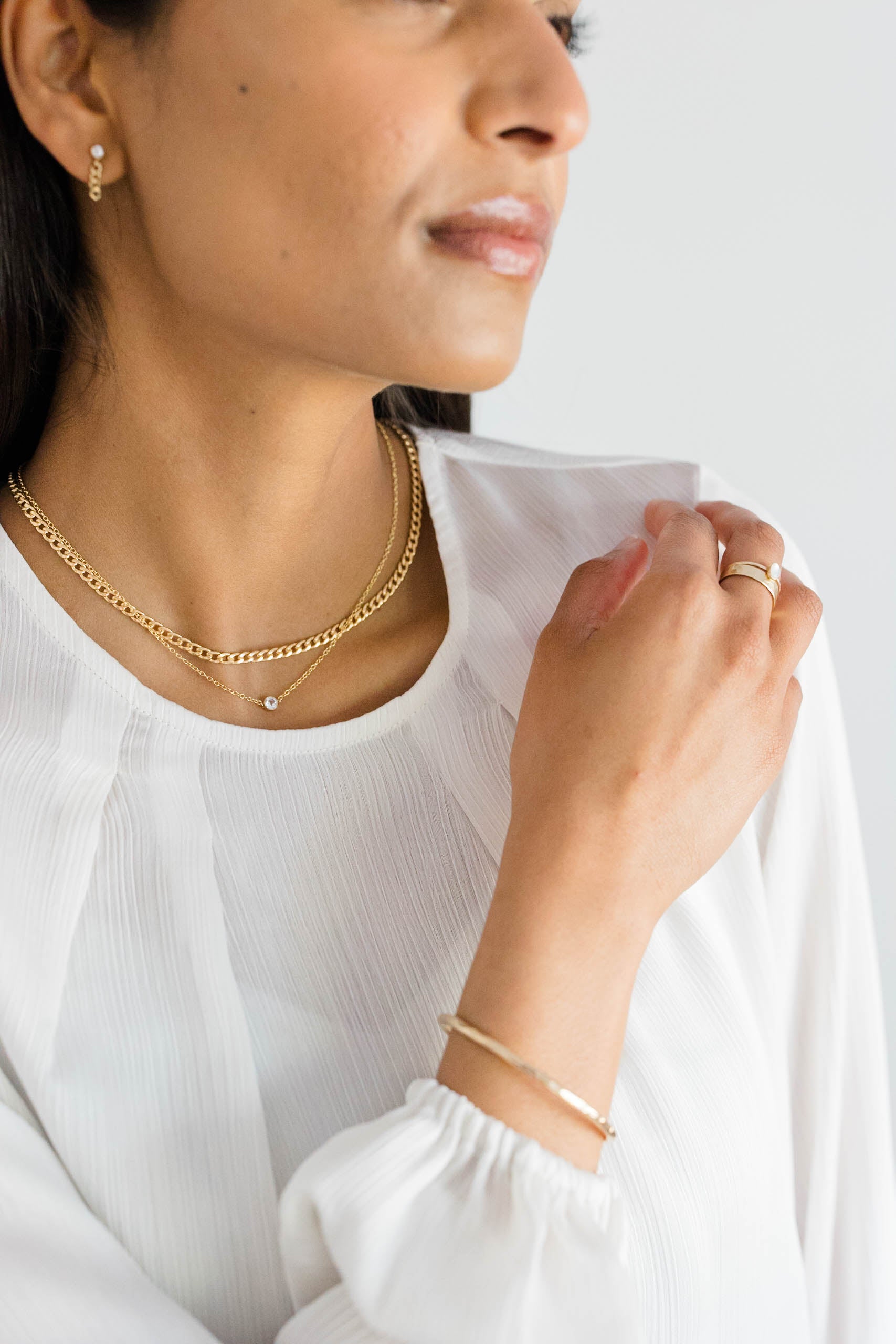 Timeless gold curb chain can be worn with other necklaces, for a layered look