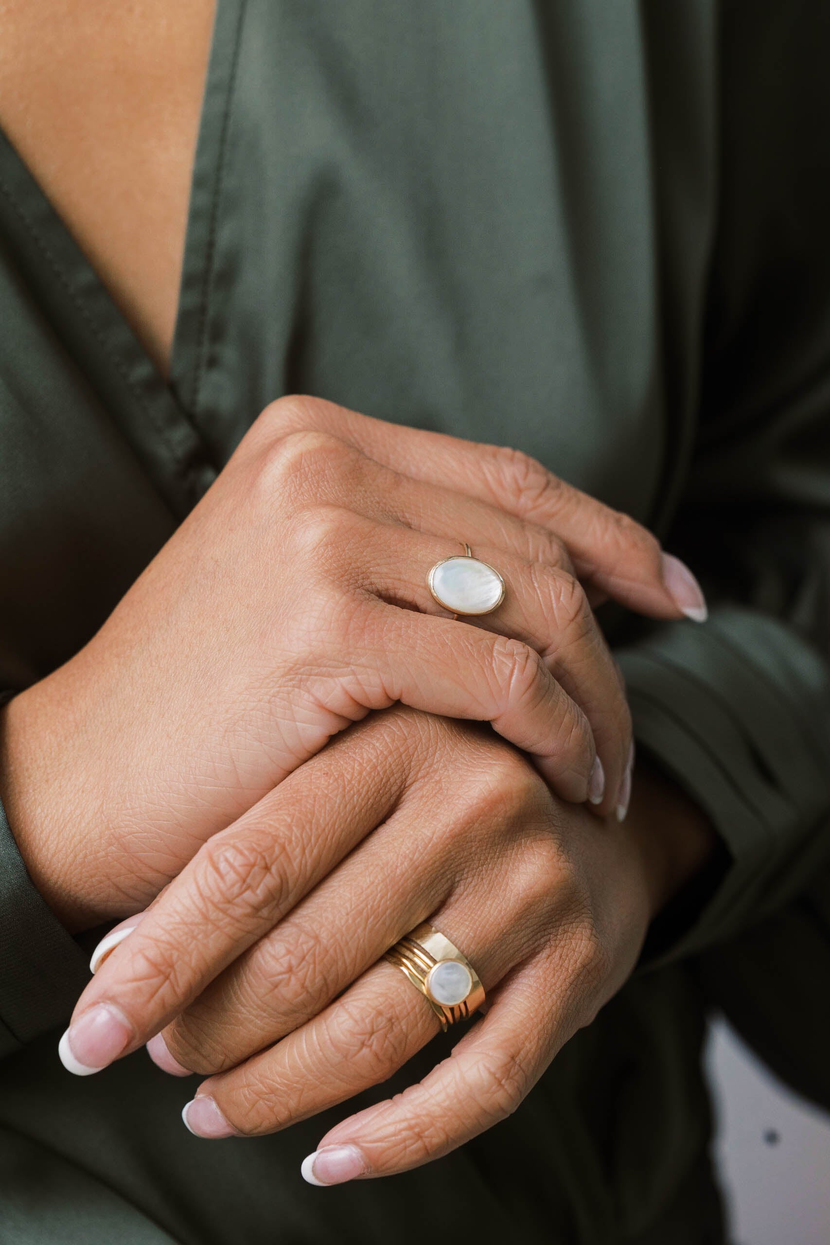 Gold oval pearl ring is made with recycled gold. The style is modern and timeless.