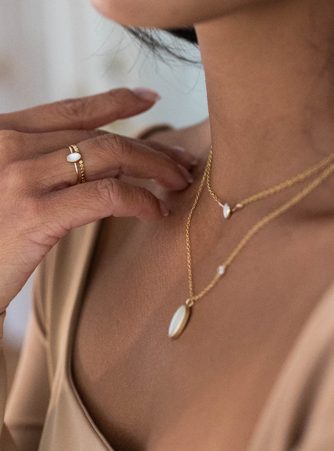 Sleek tiny pearl ring made with recycled gold. Stacking timeless ring