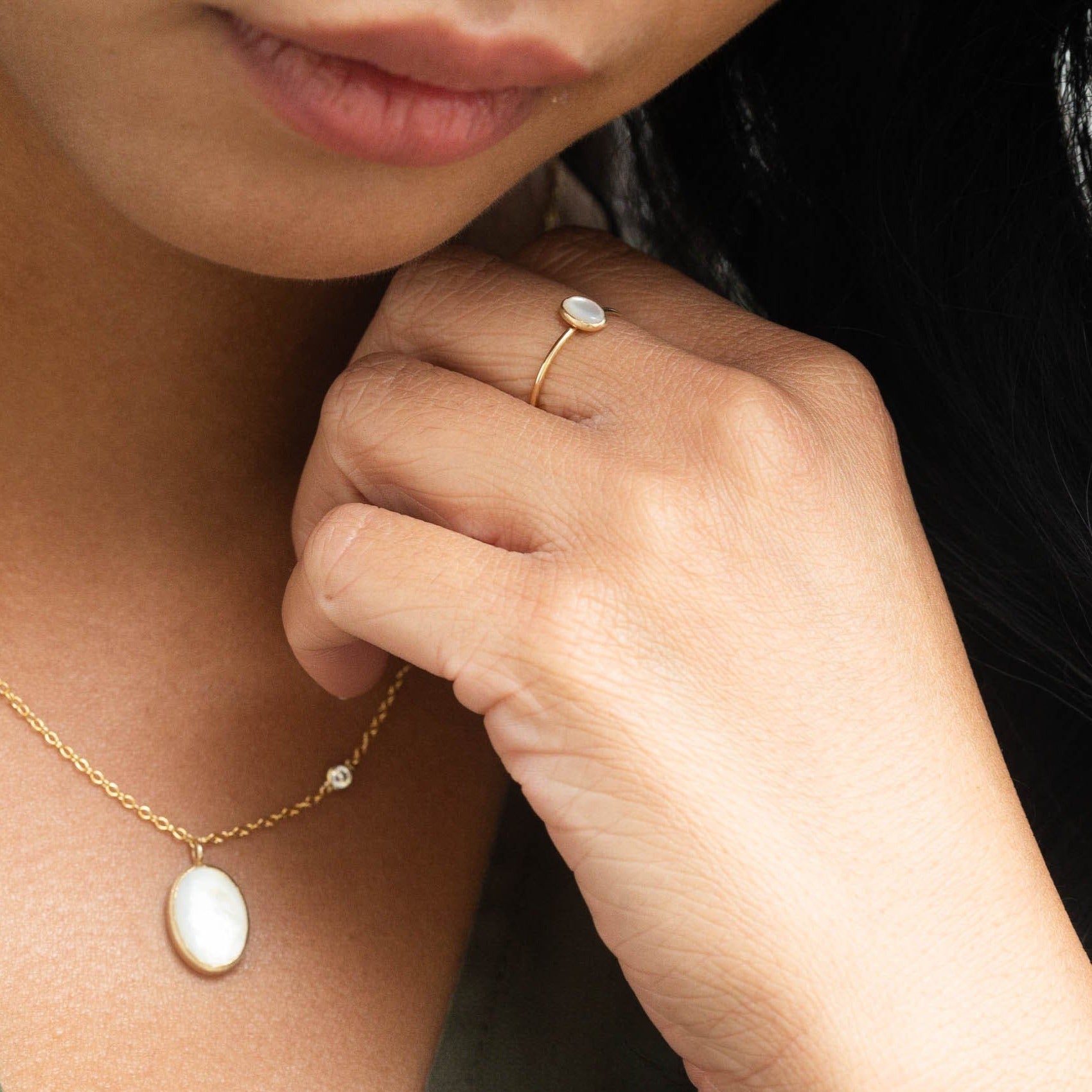 delicate stacking gold oval pearl ring that is modern and minimal