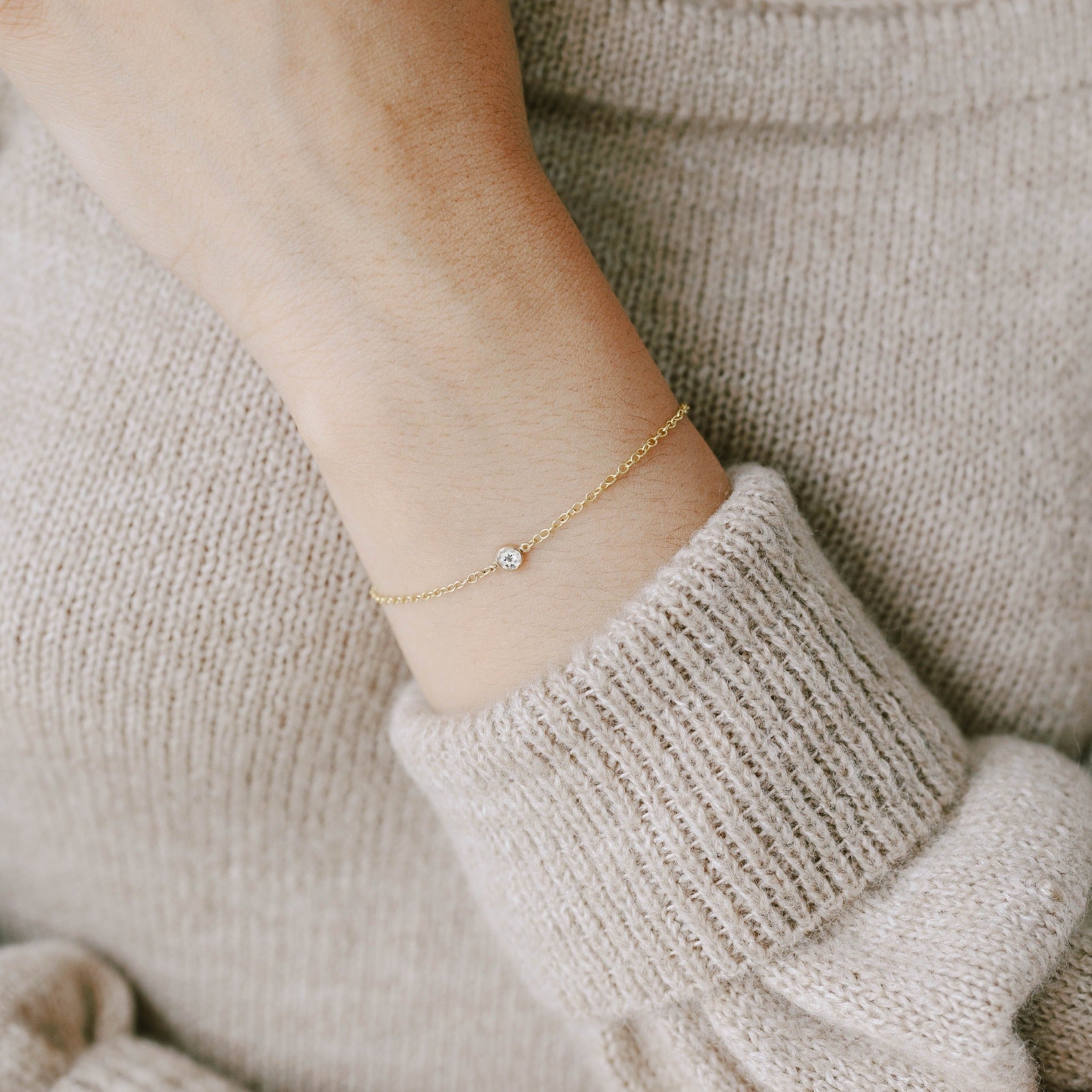 thin chain bracelet with white topaz gemstone and recycled gold