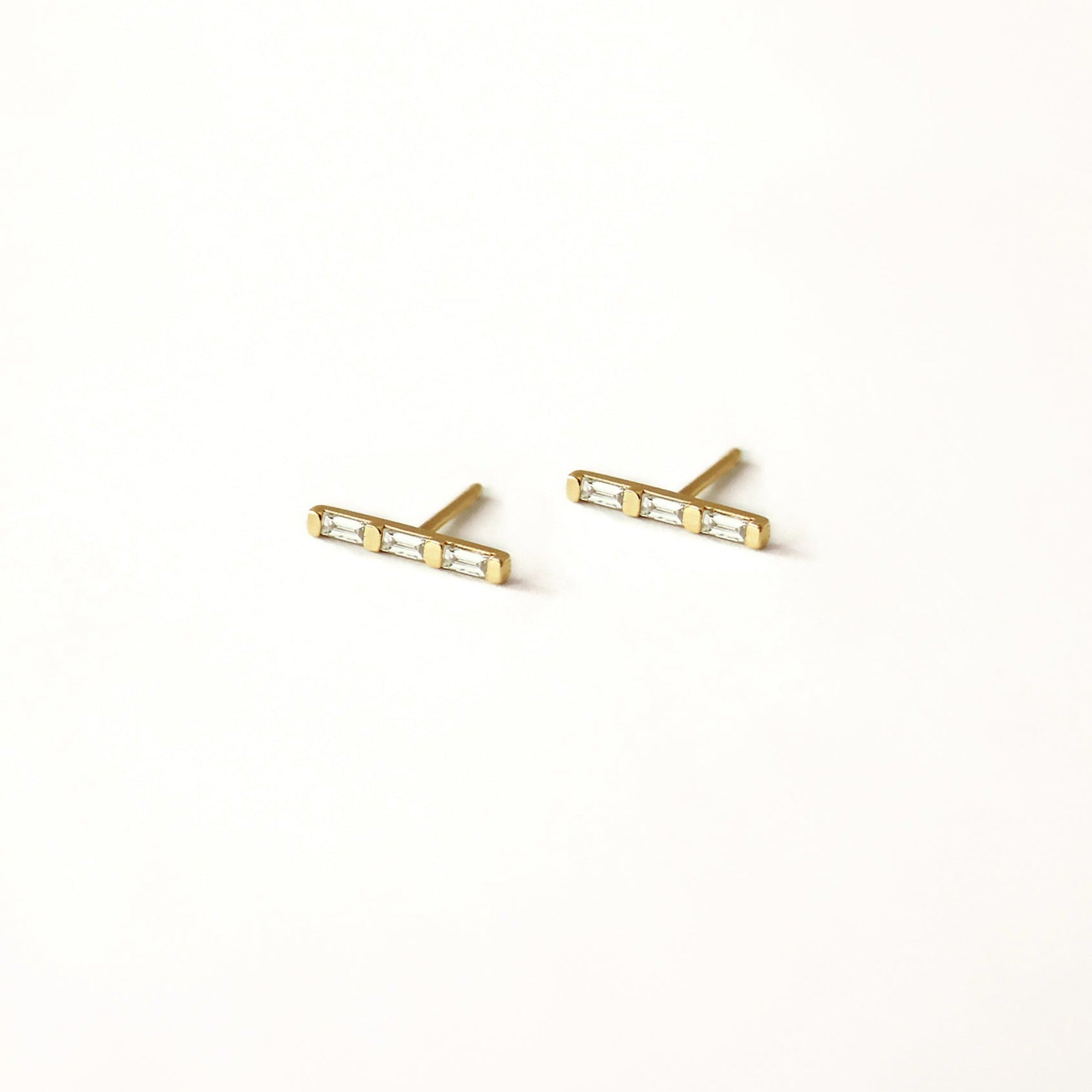 3 rectangle diamonds on each stud earring. Recycled 14k gold and sustainably sourced diamonds. 