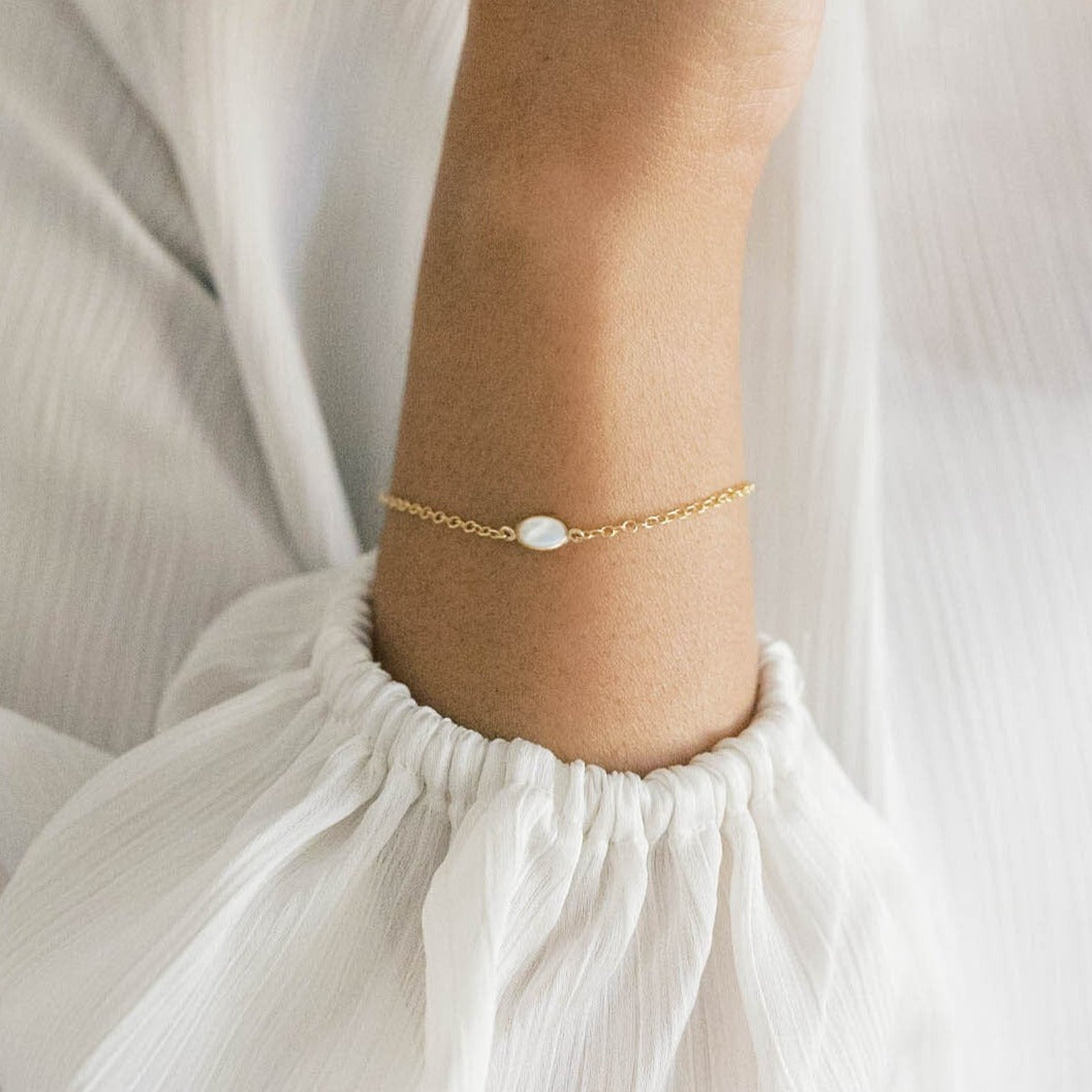Gold Bracelet with Small Oval Pearl