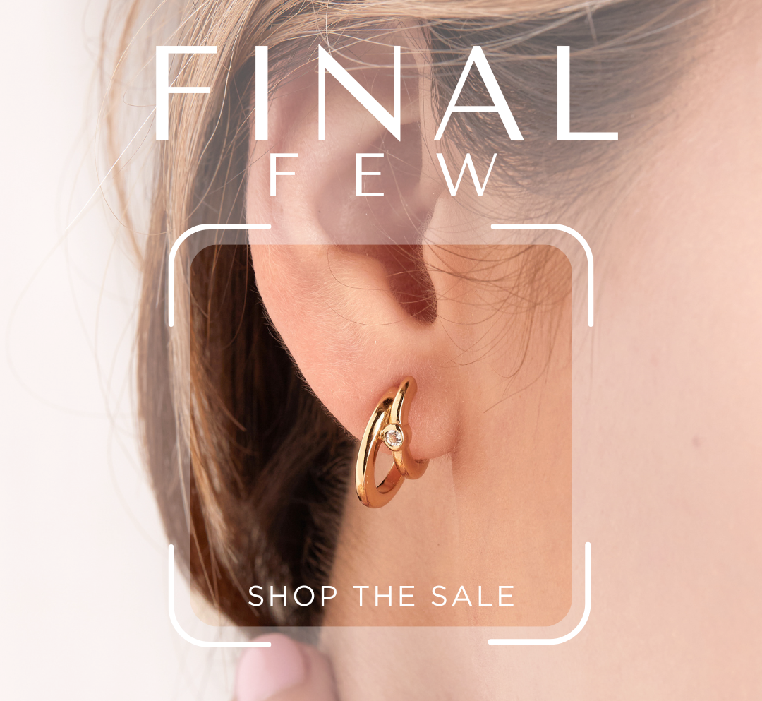 A close-up lifestyle shot of a model's ear wearing a small gold hoop earring. The image features a soft peach overlay with the text 'FINAL FEW SHOP THE SALE' in white.