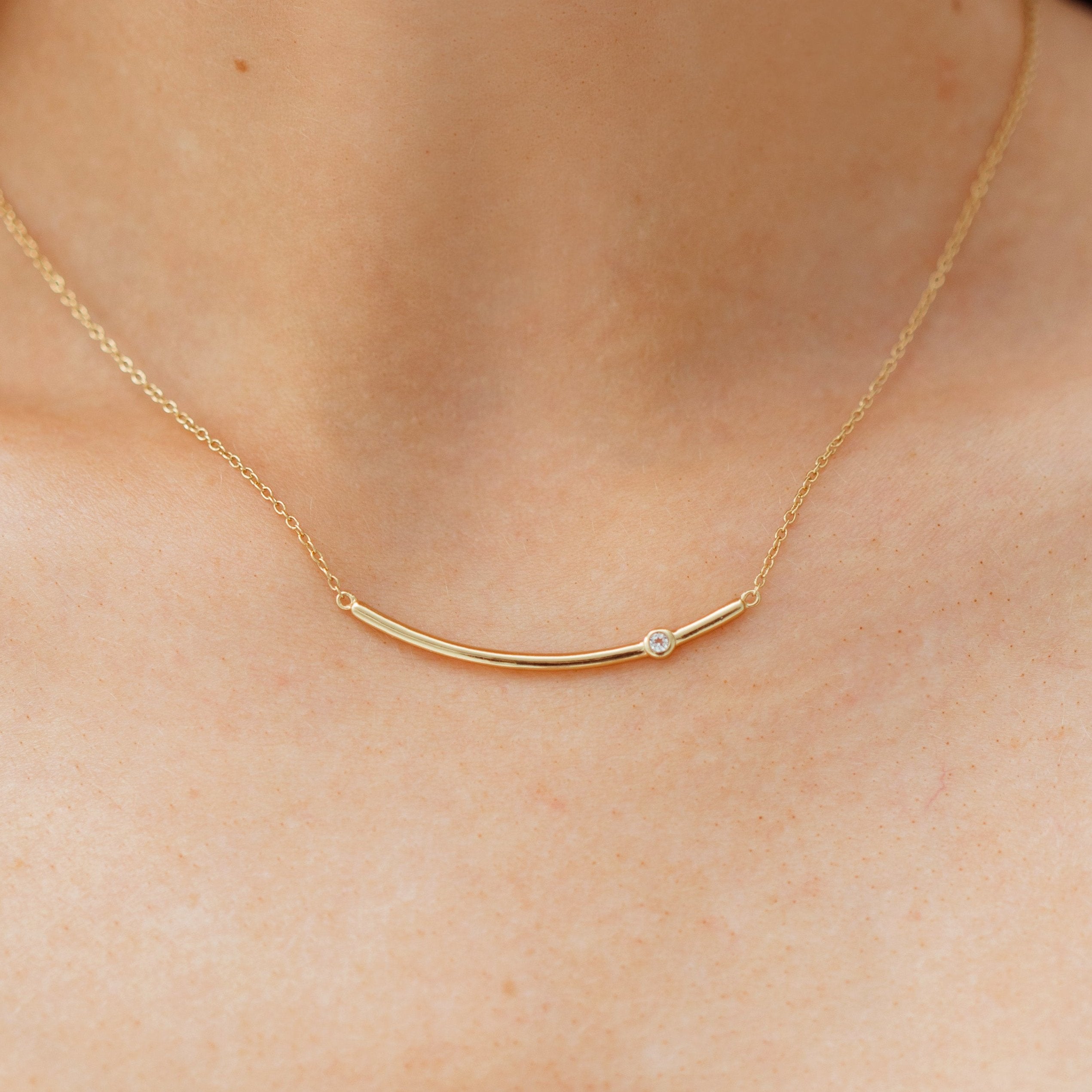 Gold Curved Bar Necklace with White Topaz