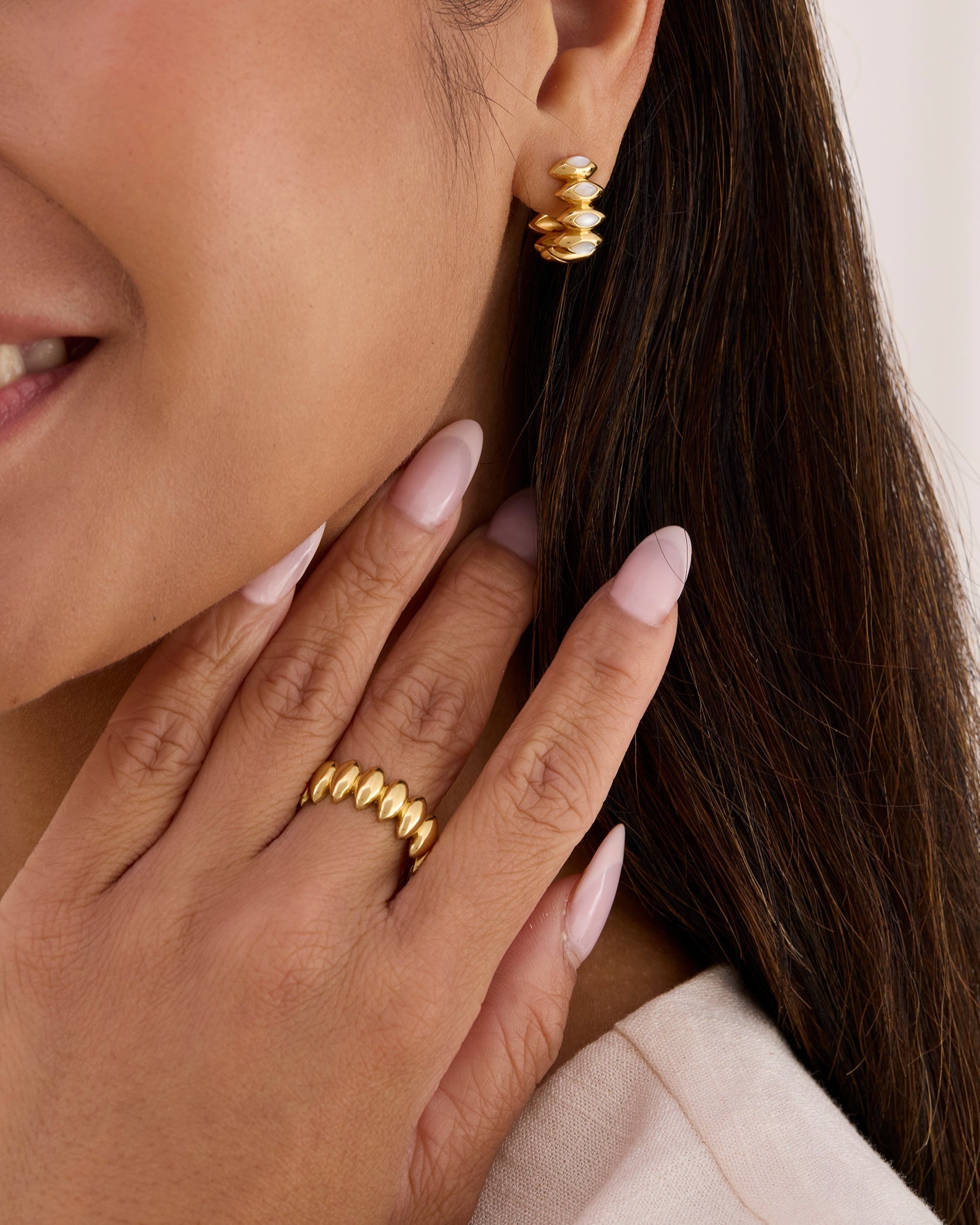 Gold wide modern sculptural ring. Ring is modern organic with a petal shape.