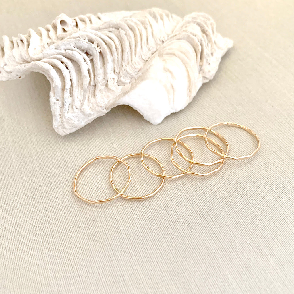 Gold thin rings that are dainty to wear everyday. Very durable and thin. They are stackable and made with recycled gold.