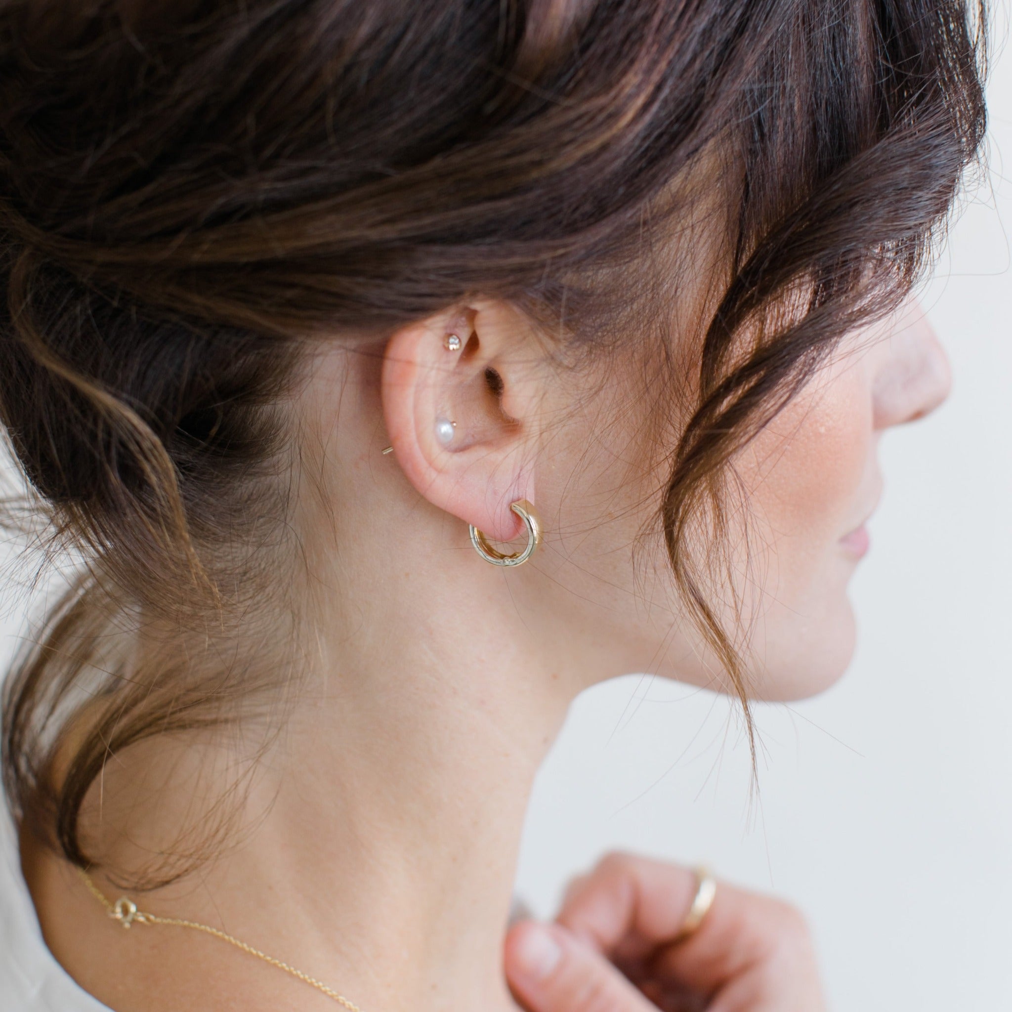 Modern minimal gold hoops look good at any angle. They are light and so great to wear all day.