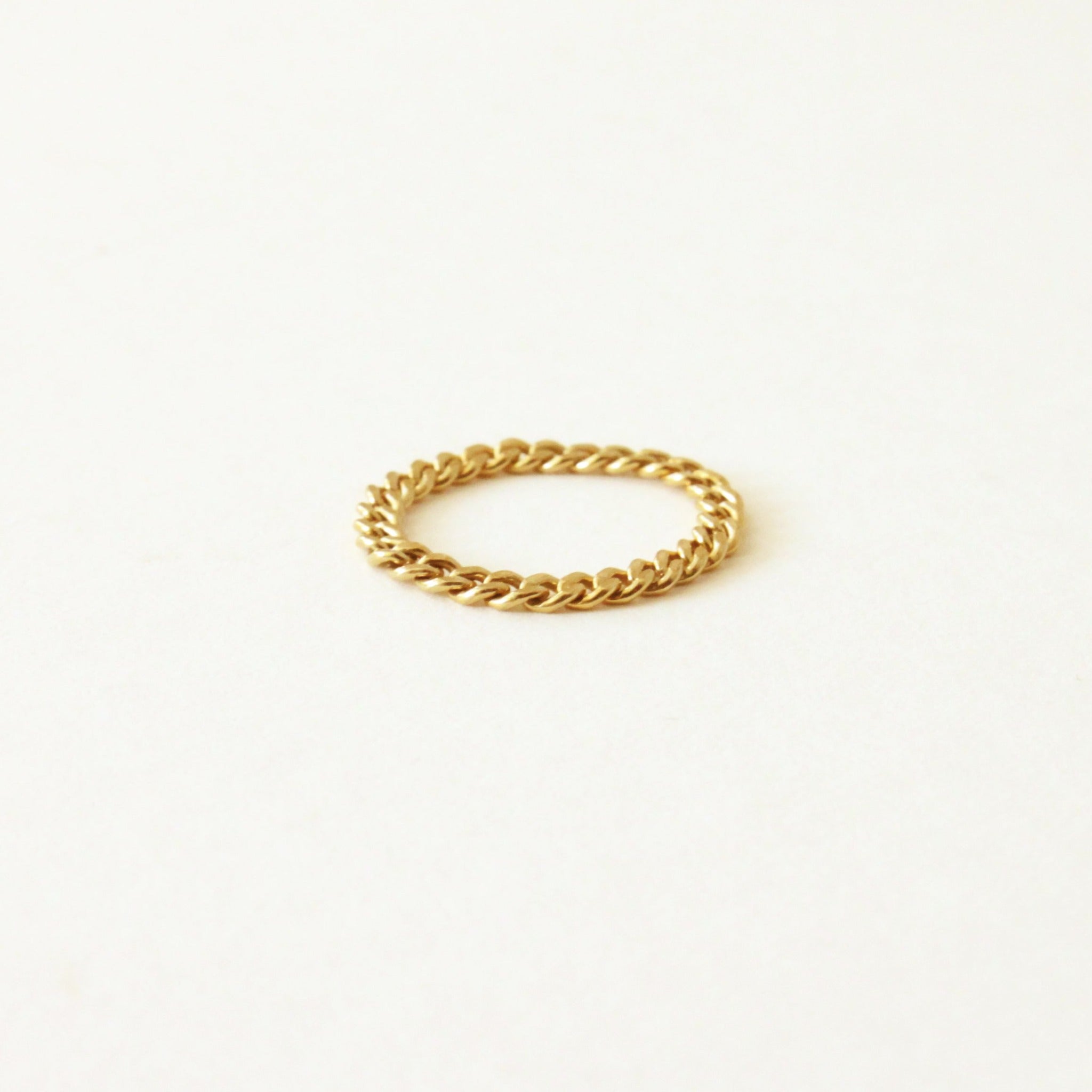 A curb chain ring made with 14k gold filled metal. Simple but strikingly unique ring. It's soft and flexible so it's comfortable to wear.
