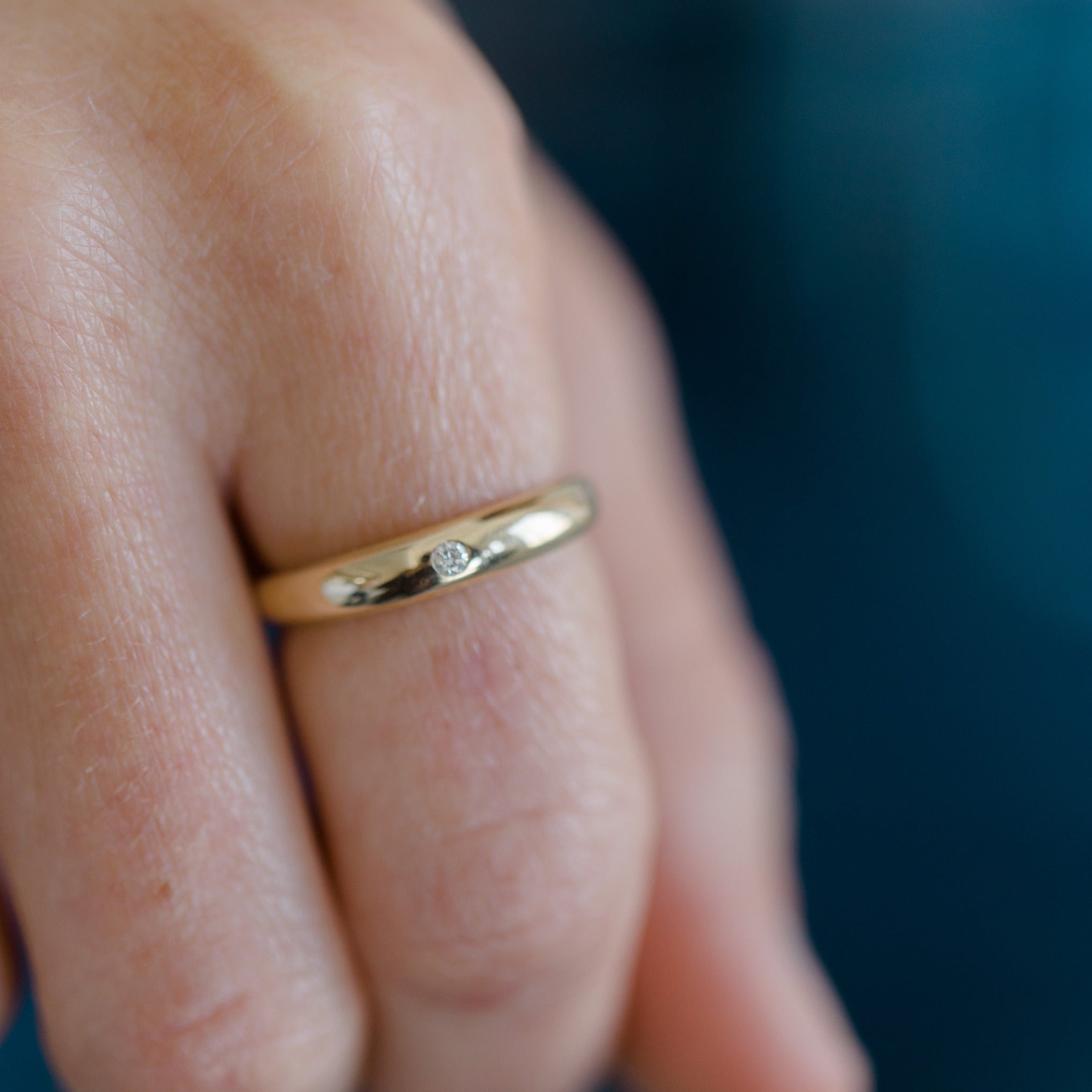 This gold ring can be worn on any finger. It is shown here on the pointer finger. It is timeless and modern. This ring can be worn everyday. It is solid gold and sturdy. A great 14k gold modern heirloom piece.